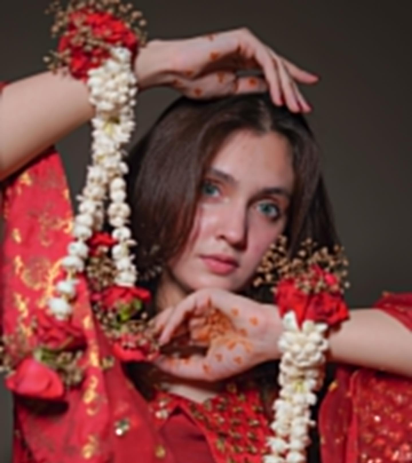 Regal Bridal Pose & Intricate Henna